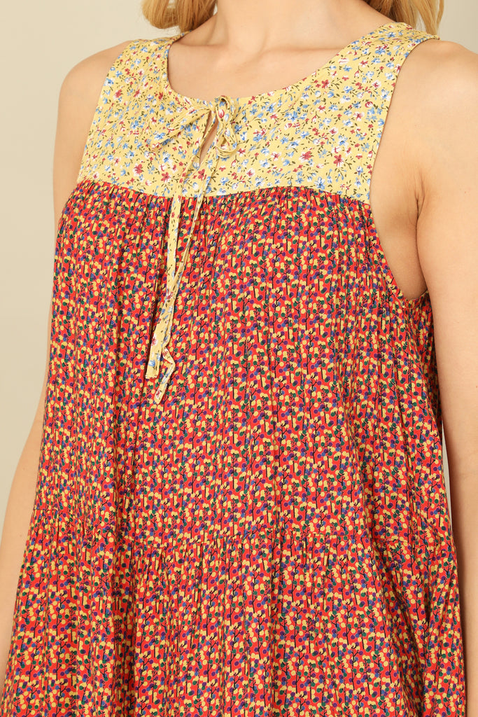 SLEEVELESS KEYHOLE TIE BABYDOLL PRINTED MINI DRESS