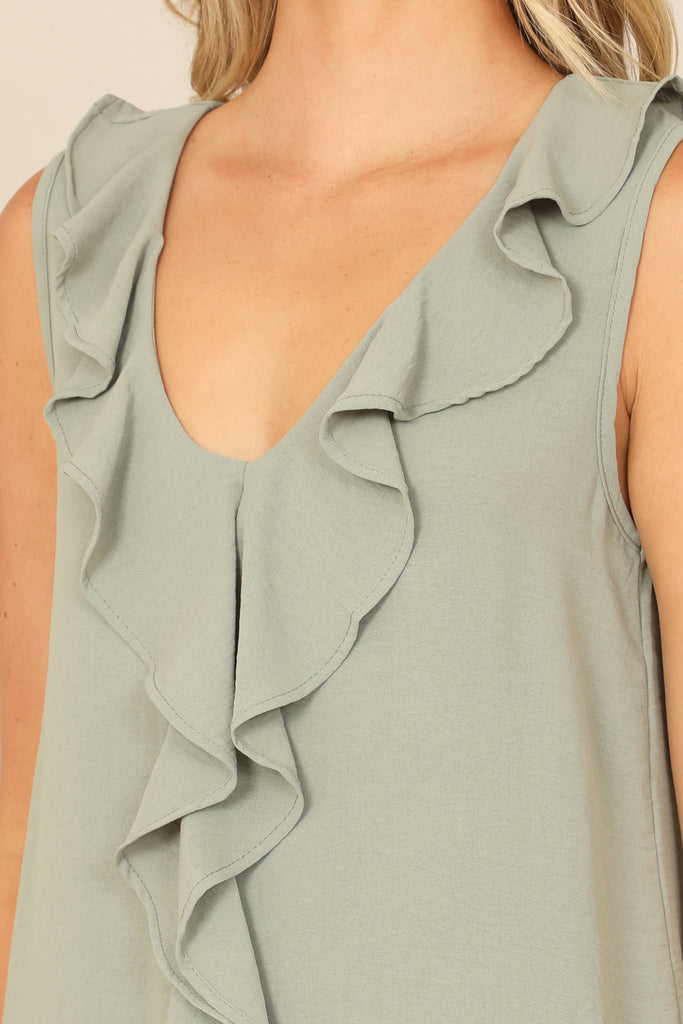 SLEEVELESS RUFFLE DETAIL SOLID TOP
