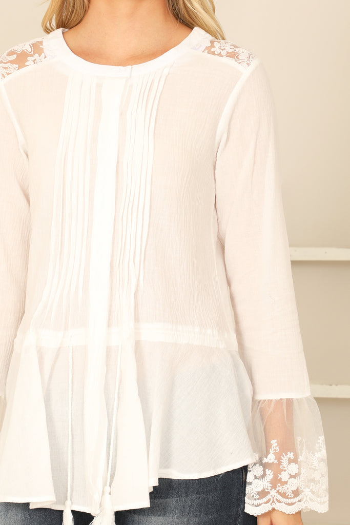 PLEATED FRONT WITH TASSEL LACE DETAIL LONG SLEEVE TOP