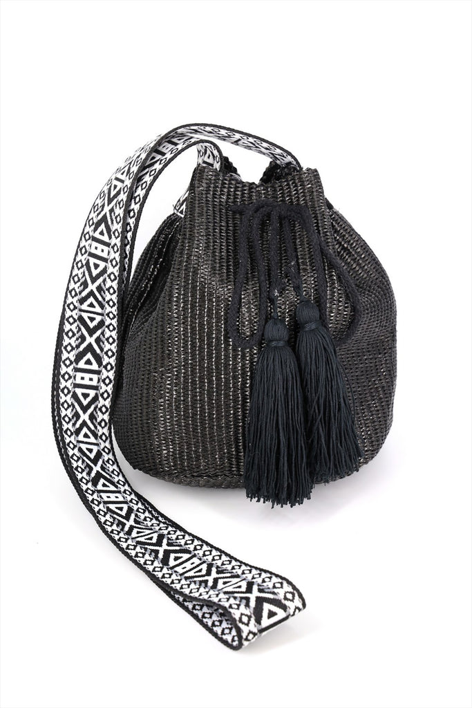 SOLID BUCKET BAG WITH AZTEC STRAP