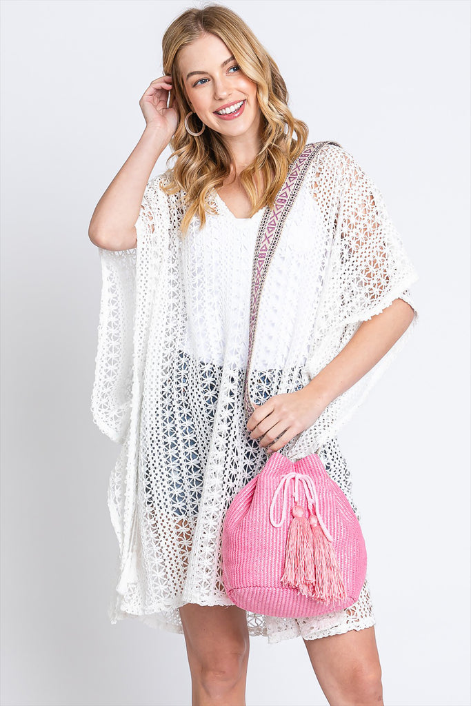 SOLID BUCKET BAG WITH AZTEC STRAP