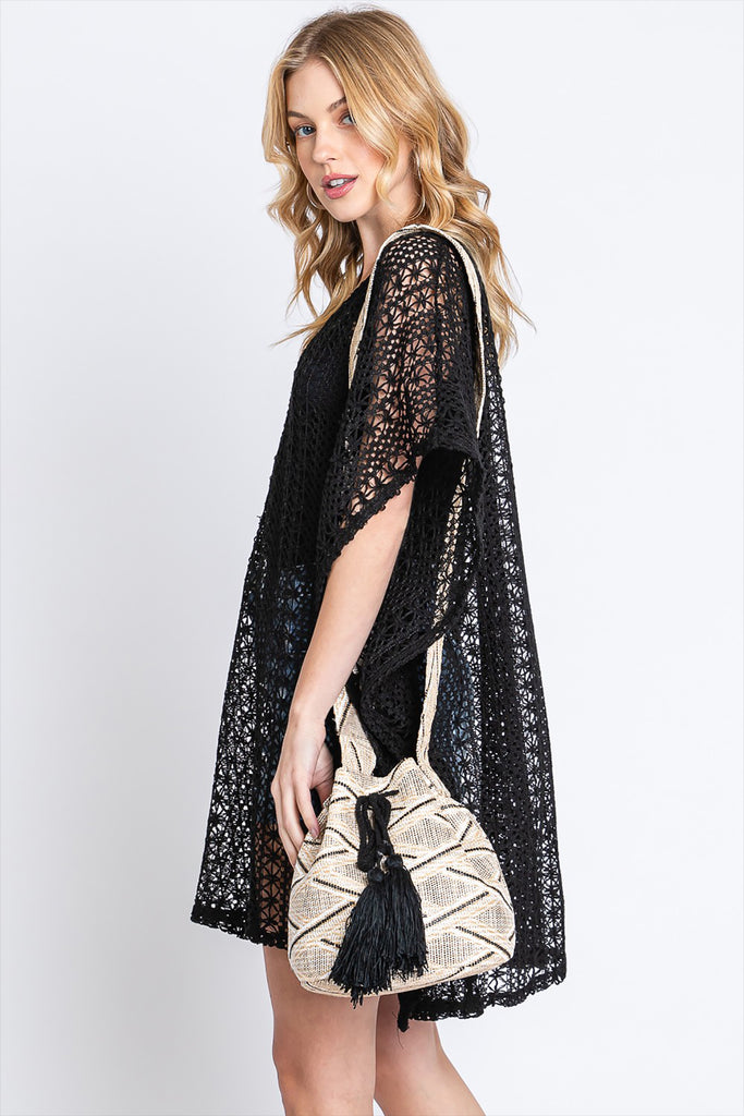 SOLID BUCKET BAG WITH AZTEC STRAP