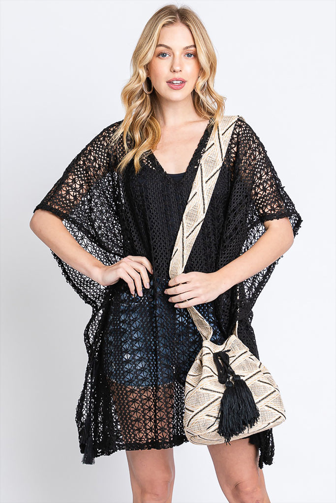 SOLID BUCKET BAG WITH AZTEC STRAP