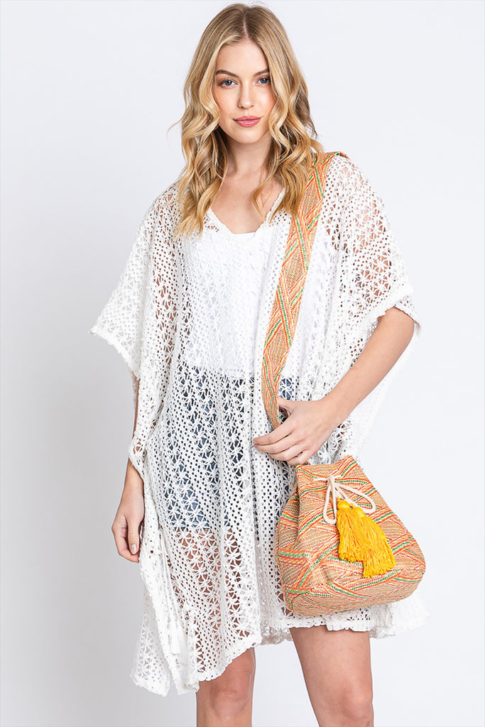 SOLID BUCKET BAG WITH AZTEC STRAP