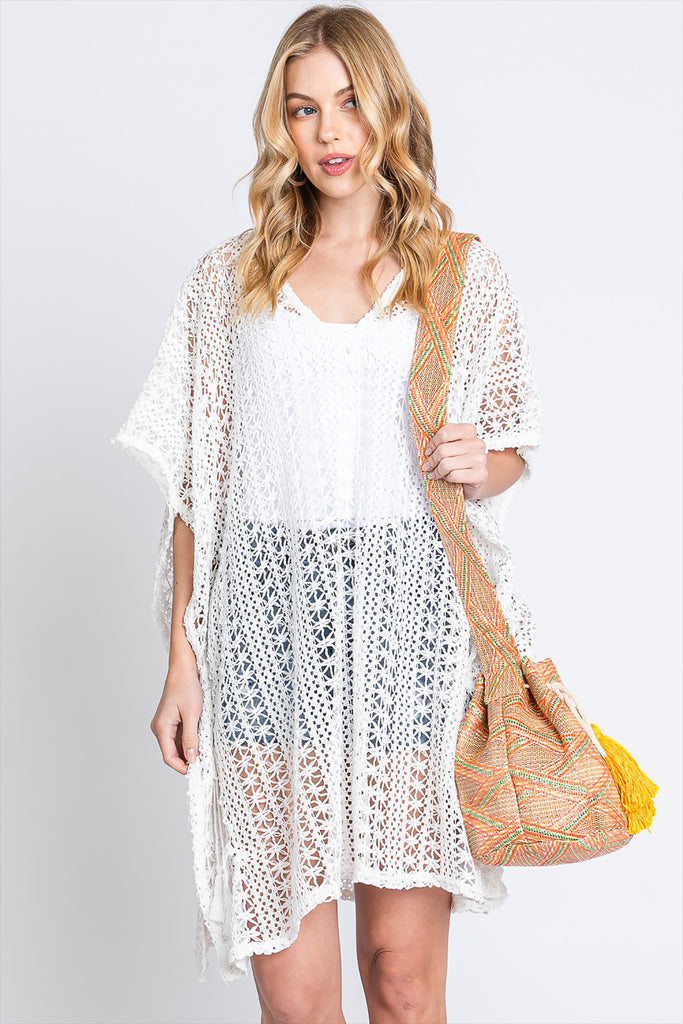 SOLID BUCKET BAG WITH AZTEC STRAP