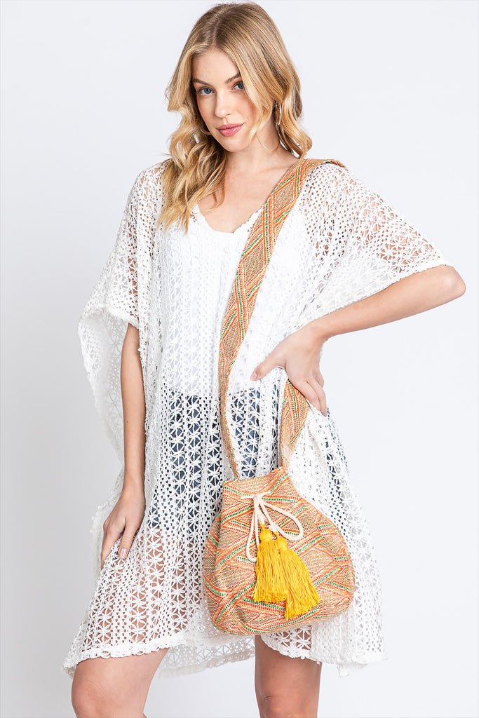 SOLID BUCKET BAG WITH AZTEC STRAP