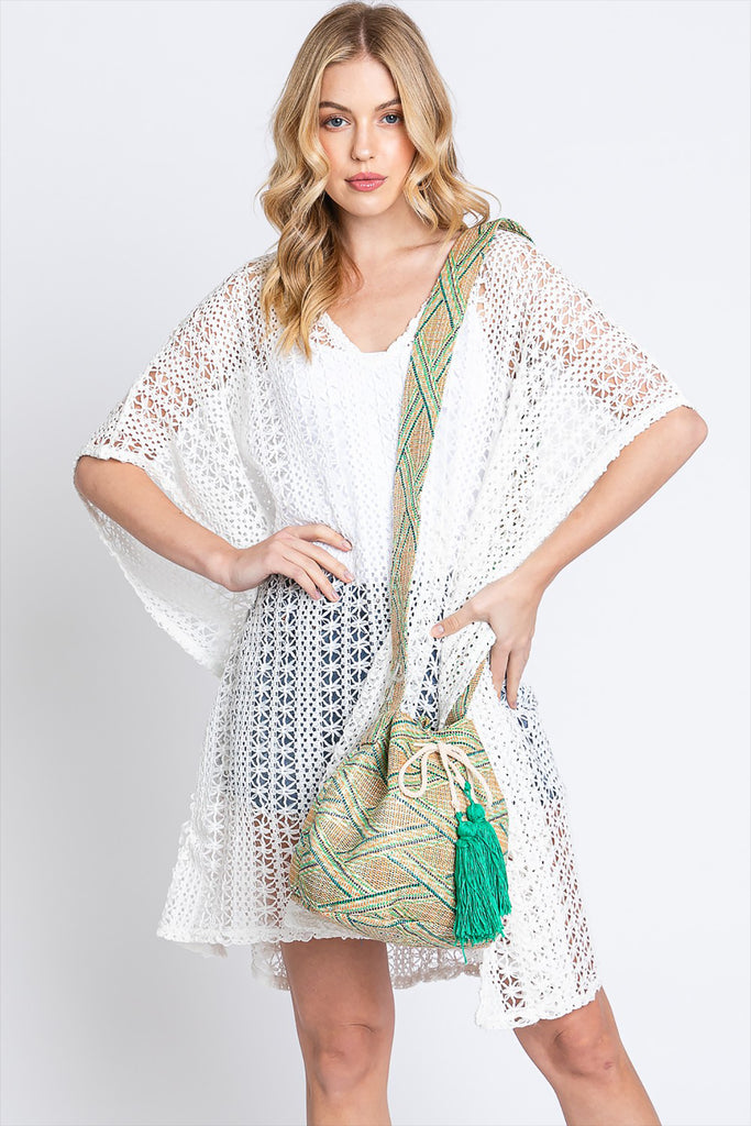 SOLID BUCKET BAG WITH AZTEC STRAP