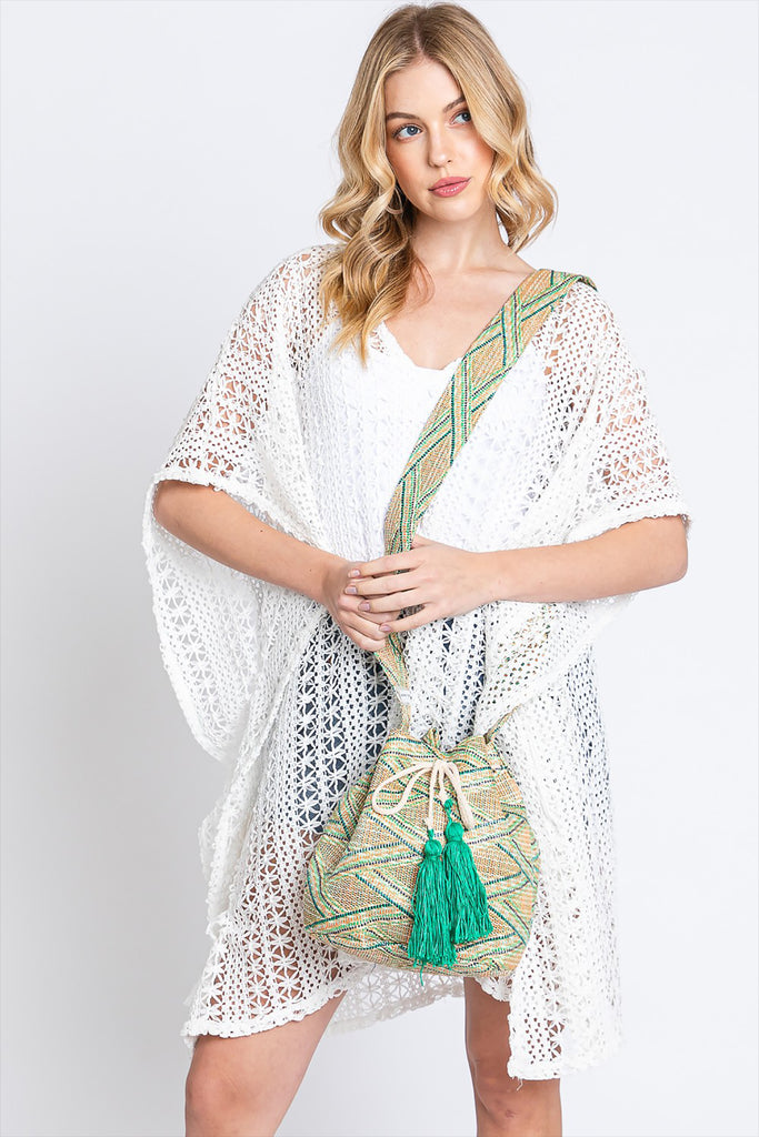 SOLID BUCKET BAG WITH AZTEC STRAP