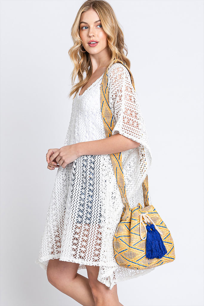SOLID BUCKET BAG WITH AZTEC STRAP