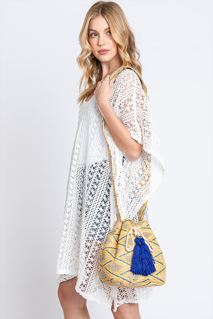 SOLID BUCKET BAG WITH AZTEC STRAP