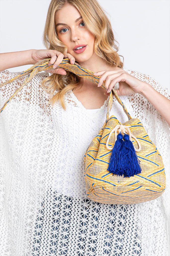 SOLID BUCKET BAG WITH AZTEC STRAP