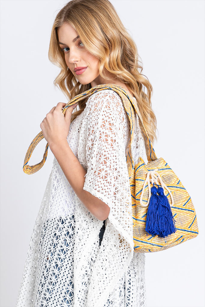 SOLID BUCKET BAG WITH AZTEC STRAP