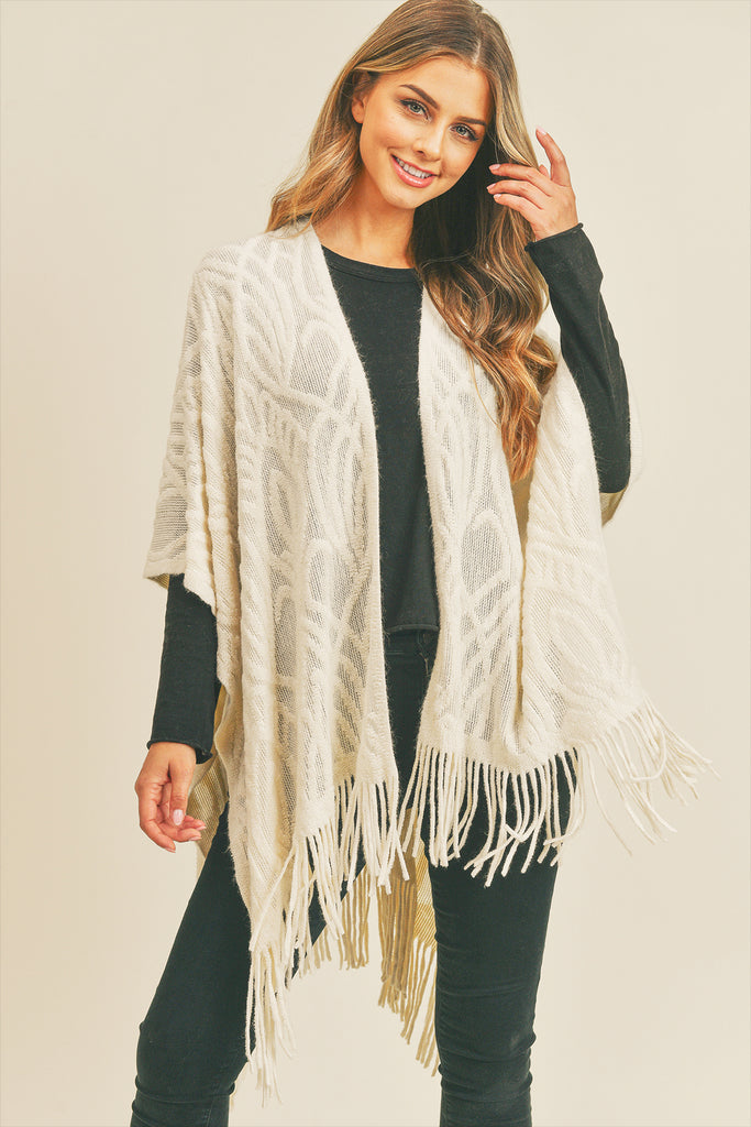 EMBOSSED PATTERN TASSEL RUANA