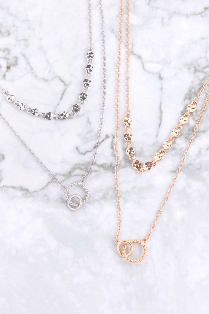 DOUBLE RING TWISTED PENDANT MULTI CHAIN LAYERED BRASS NECKLACE AND EARRING SET