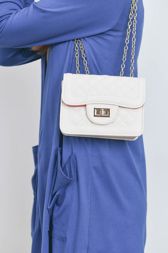 QUILTED DIAMOND LEATHER CROSS BODY BAG