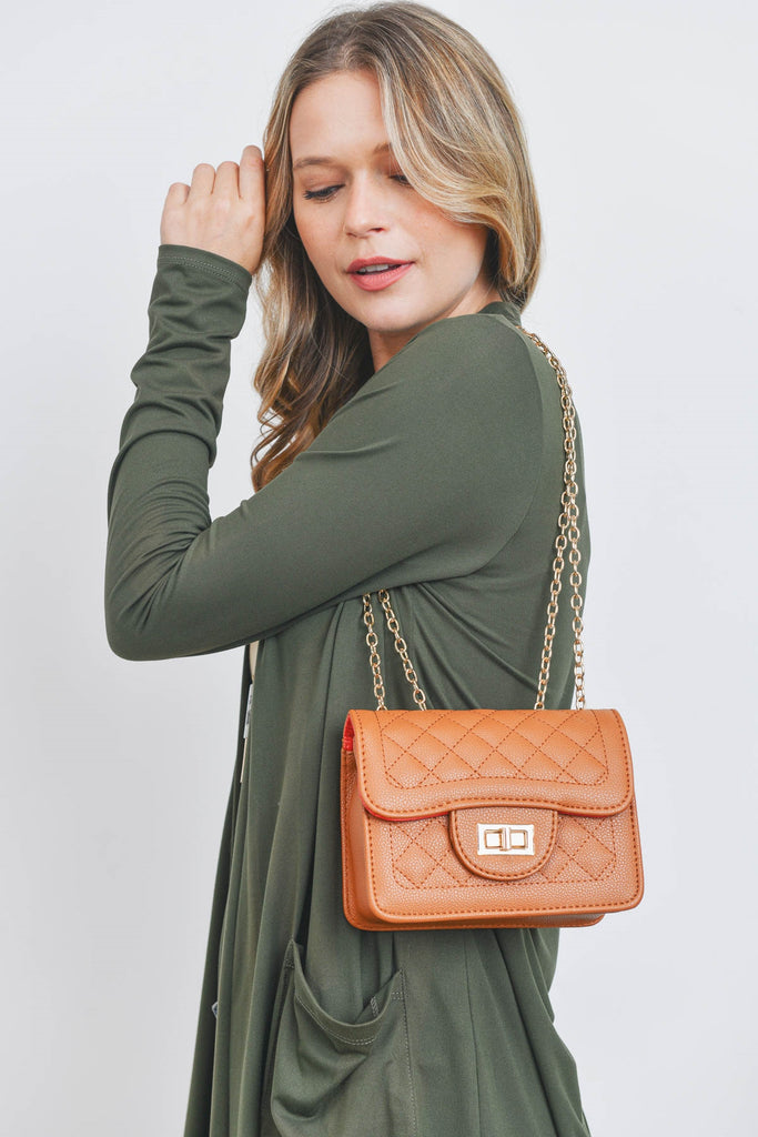 QUILTED DIAMOND LEATHER CROSS BODY BAG