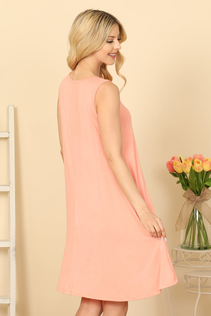 SLEEVELESS SIDE POCKET FLOWY HEM SOLID DRESS