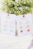 THREE-PAIR SET OF FLOWER STUD EARRINGS