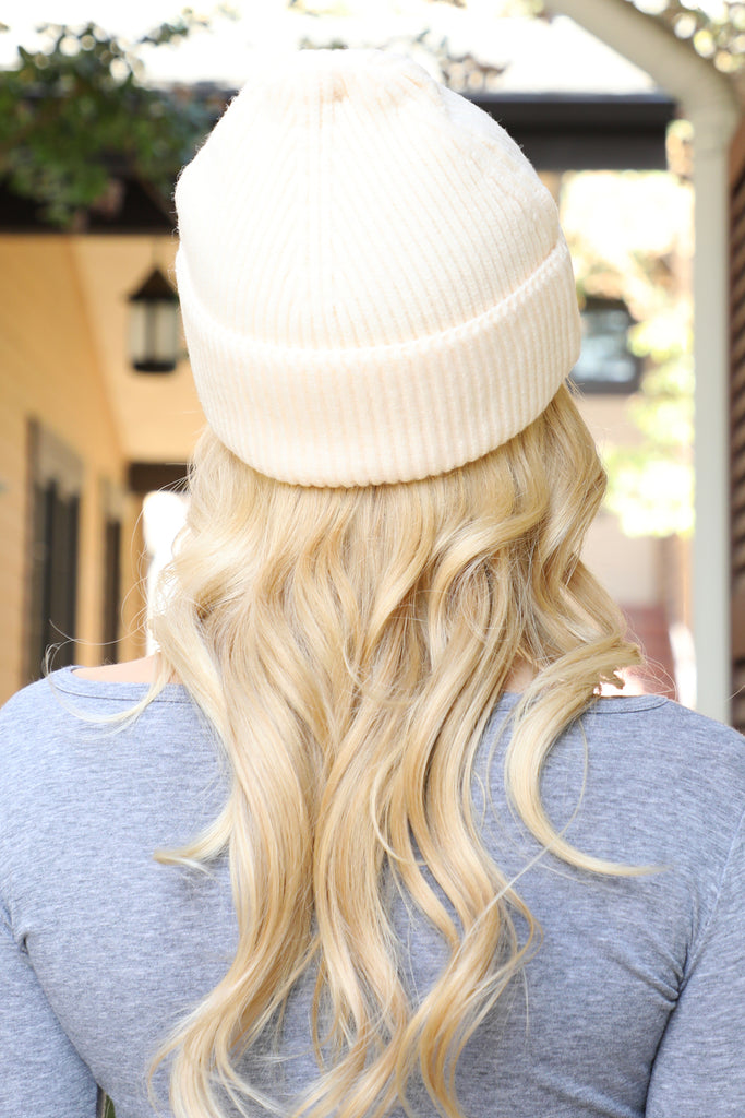 KNITTED BEANIE WITH SMILEY FACE