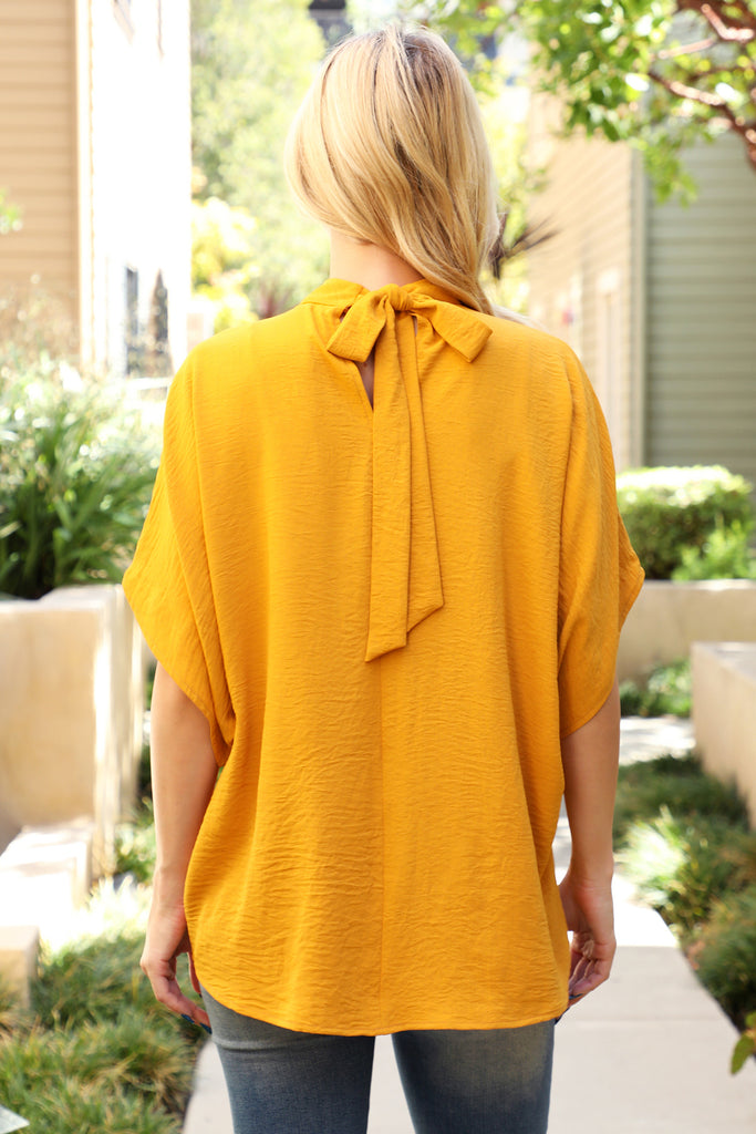 Back Ribbon Detail Turtle Neckline Dolman Top