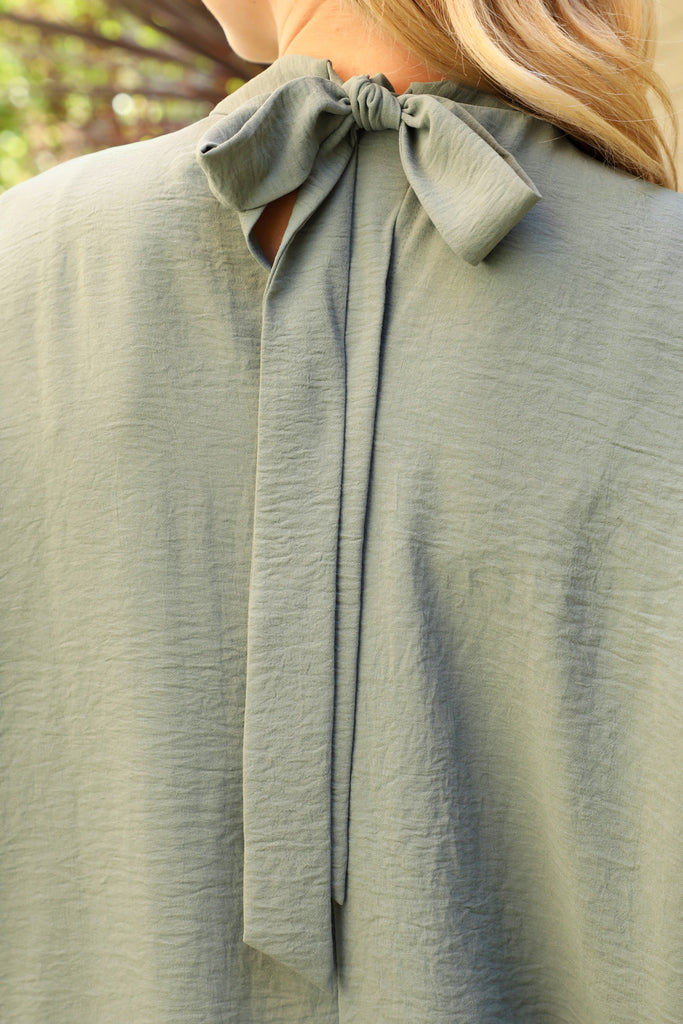 Back Ribbon Detail Turtle Neckline Dolman Top