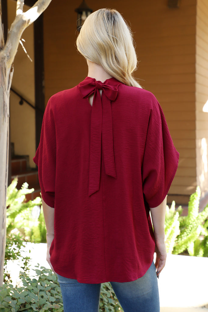 Back Ribbon Detail Turtle Neckline Dolman Top